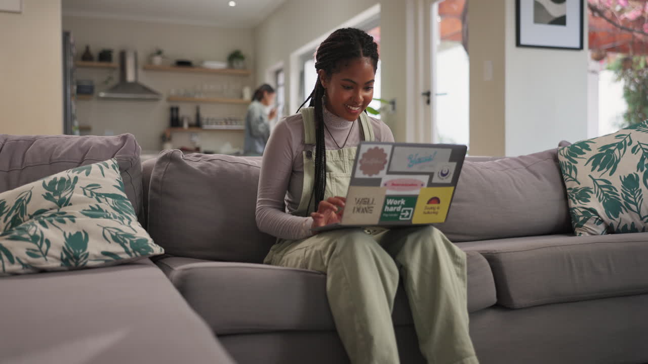 Woman working on laptop at home