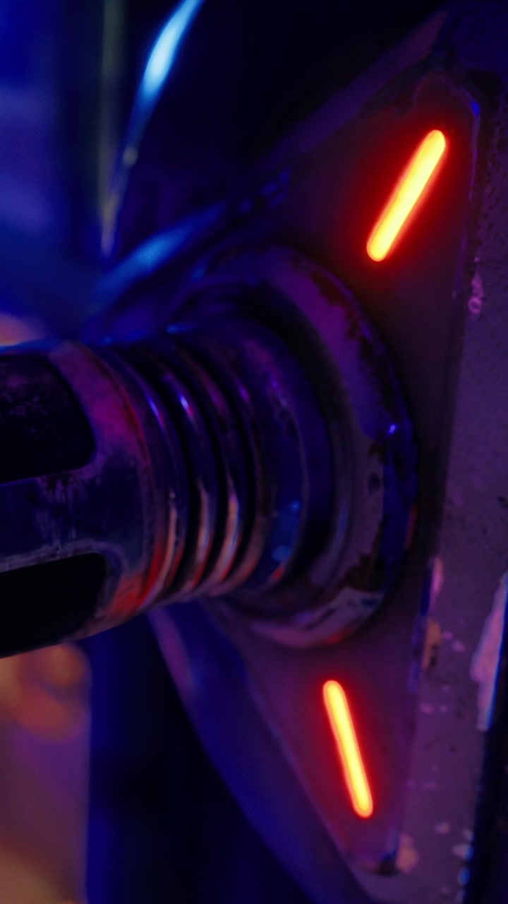 Weightlifting equipment with glowing lights during a workout session in gym