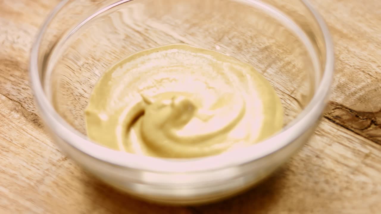 Add vessel to the mustard. 4k cinematography video recipe