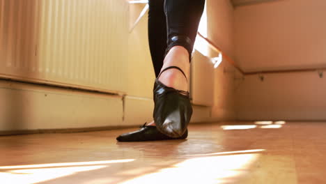 male dancer practicing a ballet dance