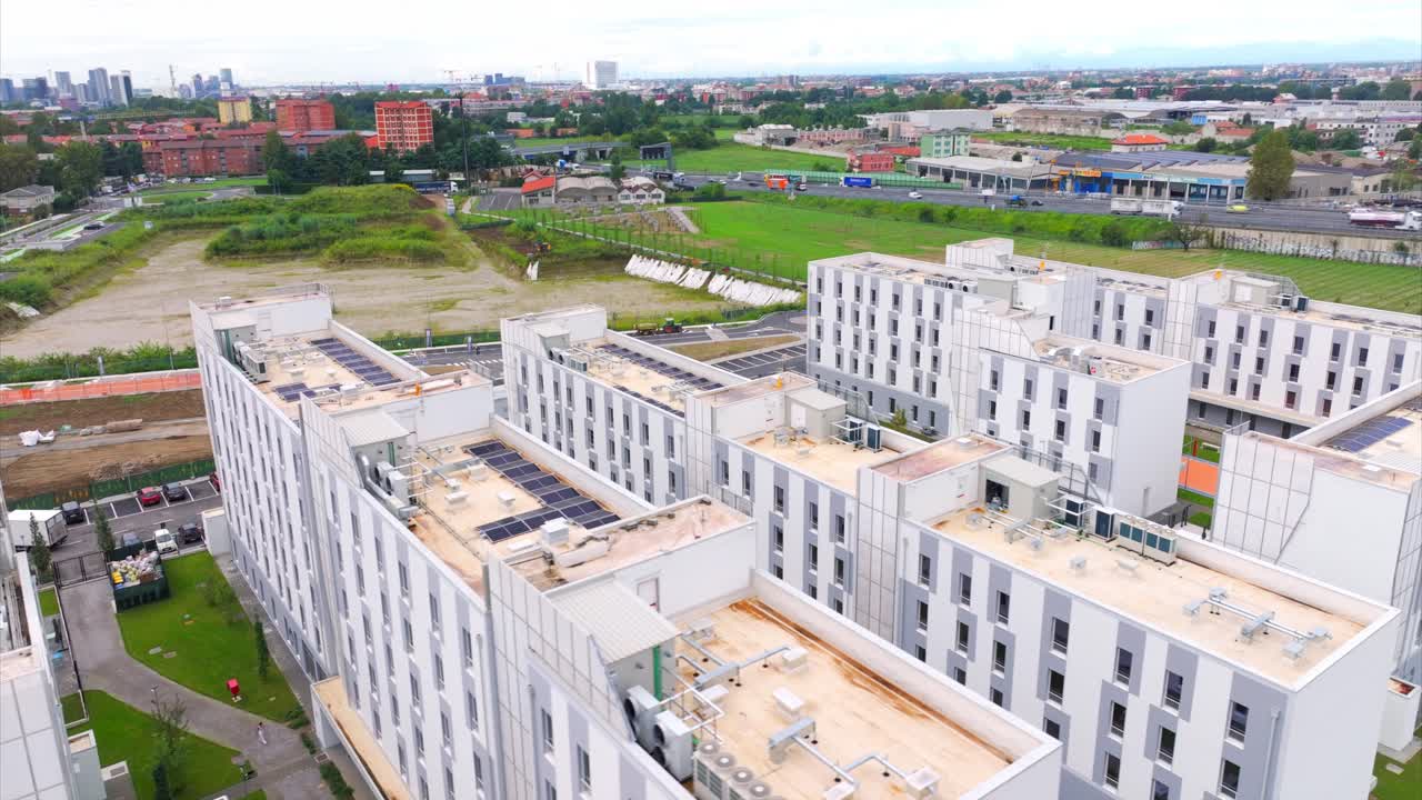 Drone flying over roof of Student Campus X or CX Milan, Novate Milanese, Italy. Aerial view