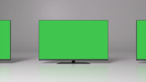 two green screen tvs