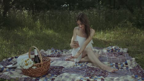 joyful woman taking selfie with engagement ring