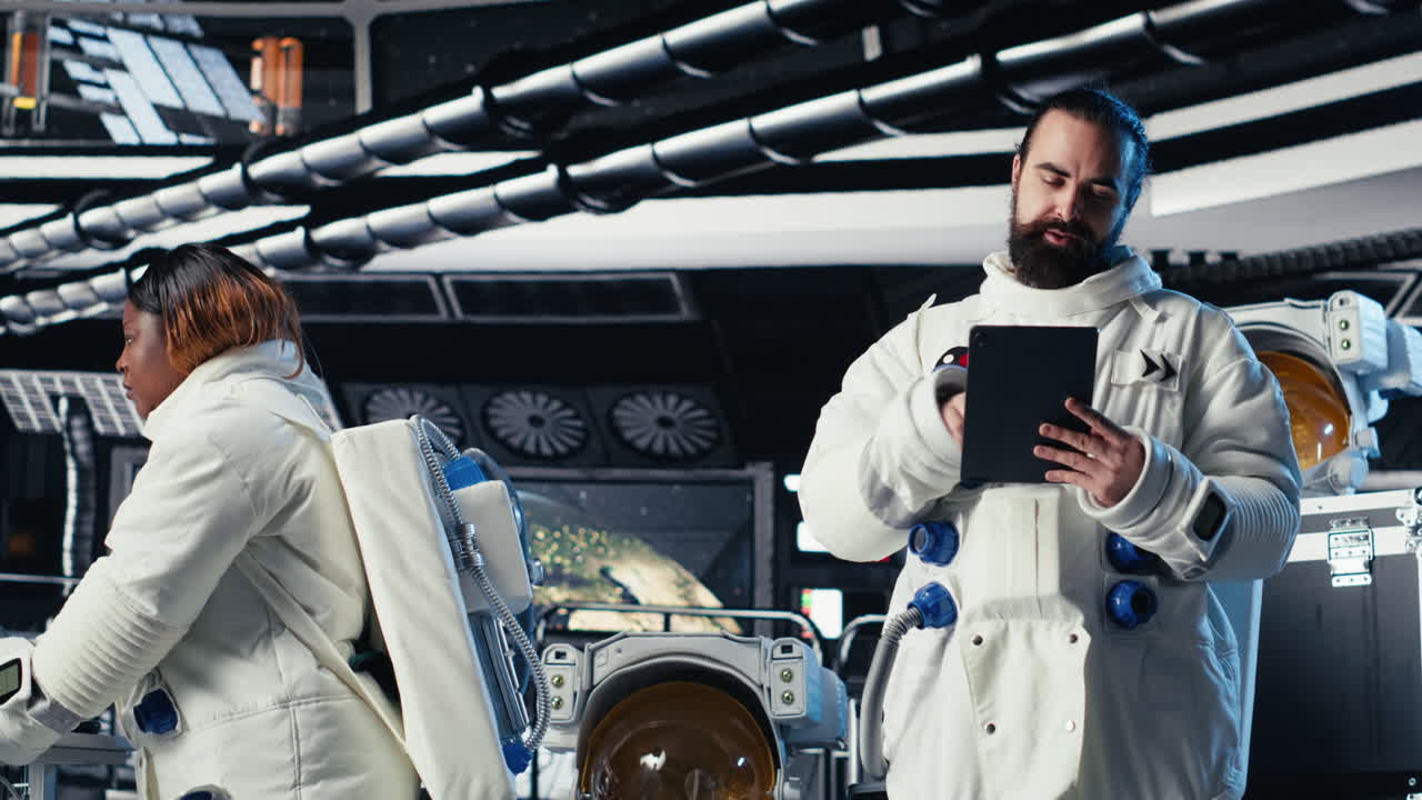 Cosmonaut verifying navigation coordinates on tablet in spaceship