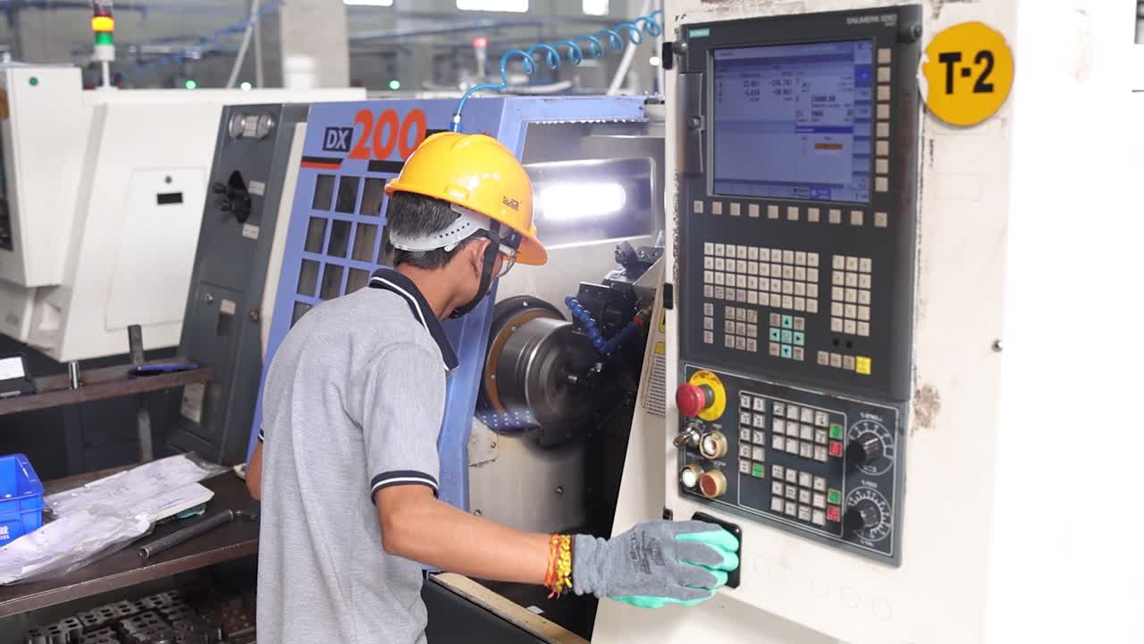 workers work CNC machine IN factory. Industry 5.0, industrial 4.0 concept