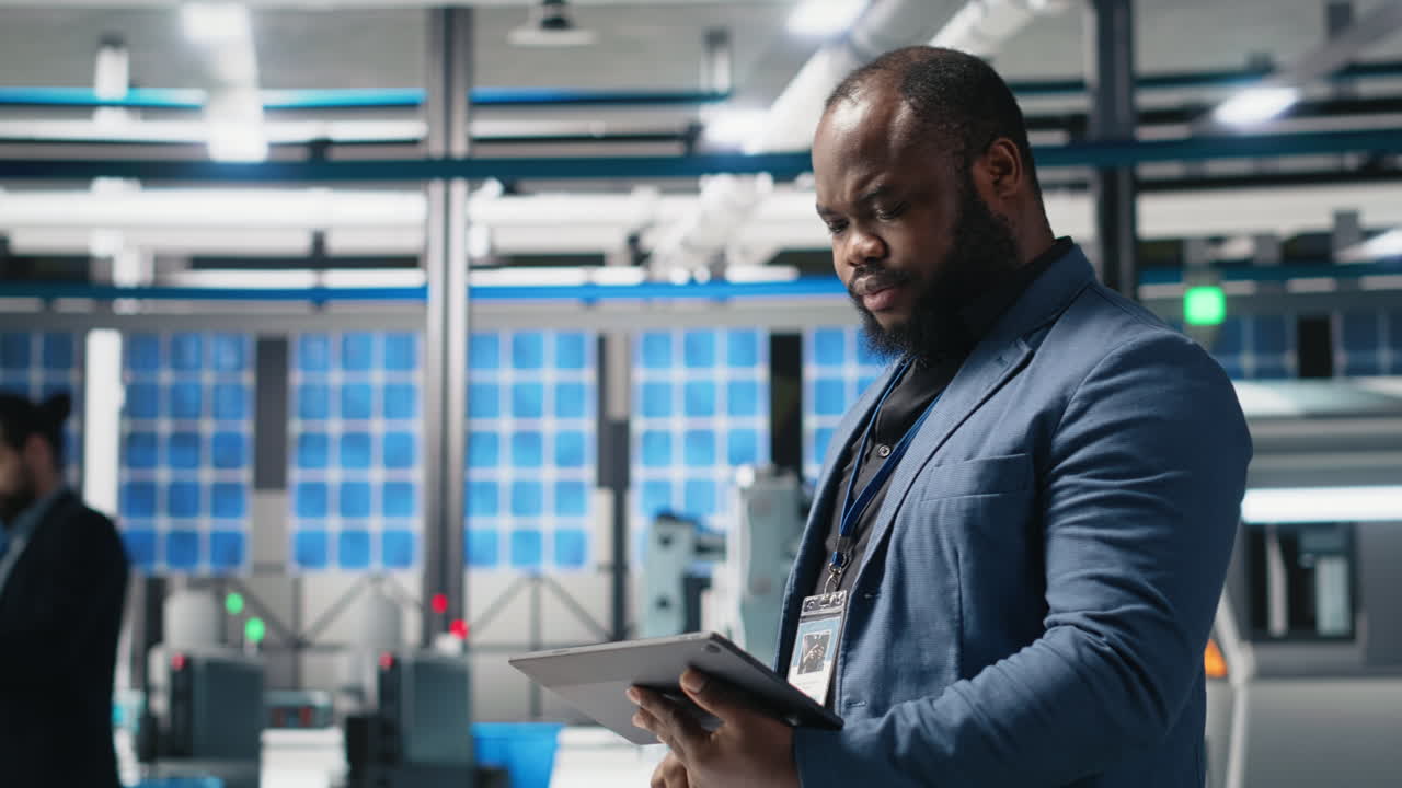 Man using tablet in factory