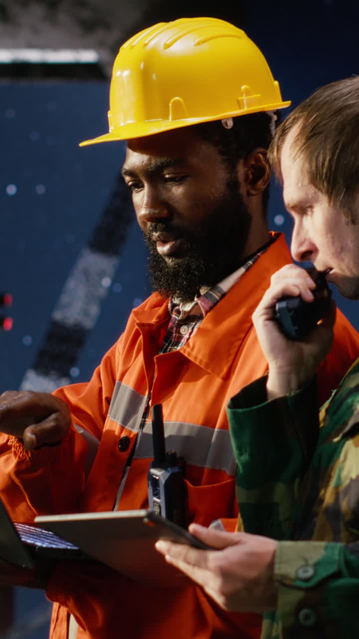 Vertical Video Soldier in uniform operate communication devices during a maritime mission