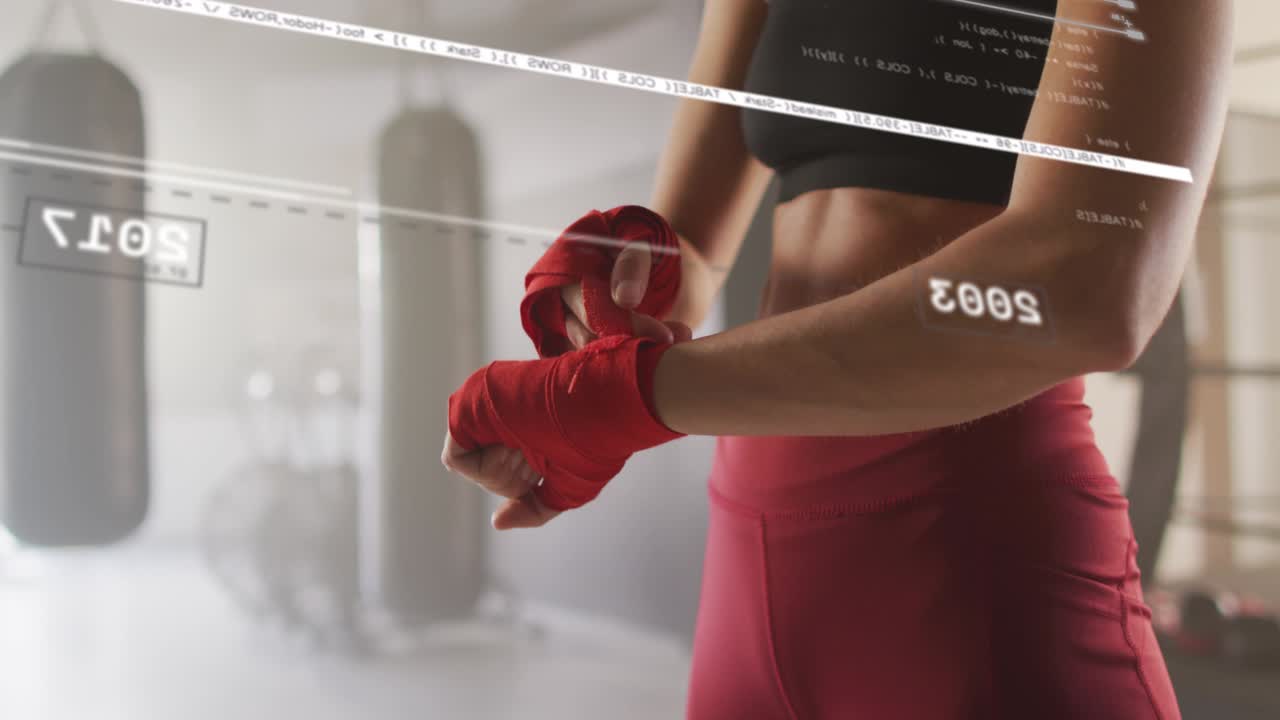 Female athlete threading red hand wrap, preparing for boxing while HUD scanning over hands and bags