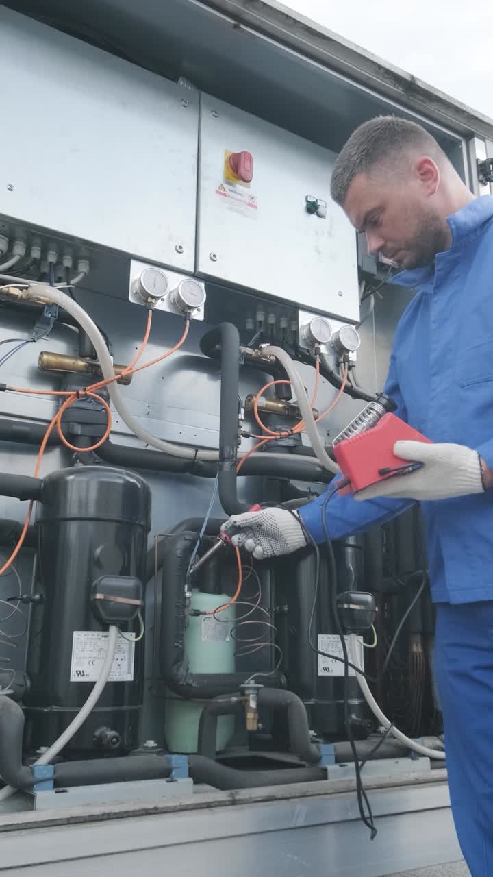 HVAC Technician Inspecting Equipment