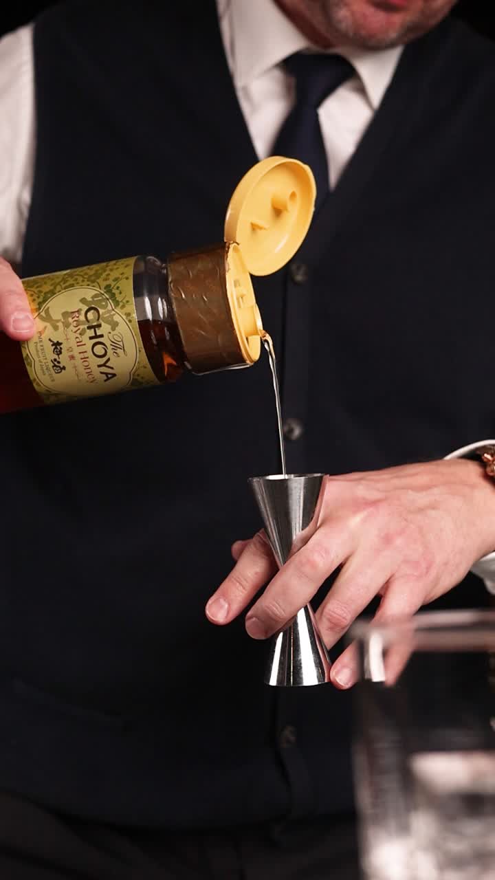 Bartender preparing a cocktail with Choya