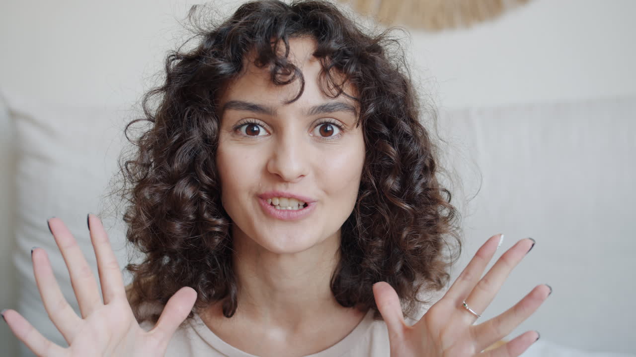 Woman Video Conferencing in Bedroom