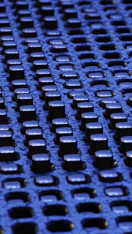 blue background of black graphite cubes. vertical looped video