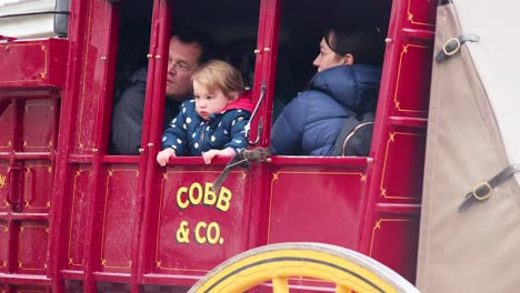 children enjoying a horse-drawn carriage ride