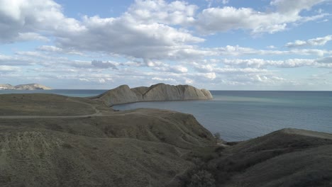 coastal landscape with cliffs and sea