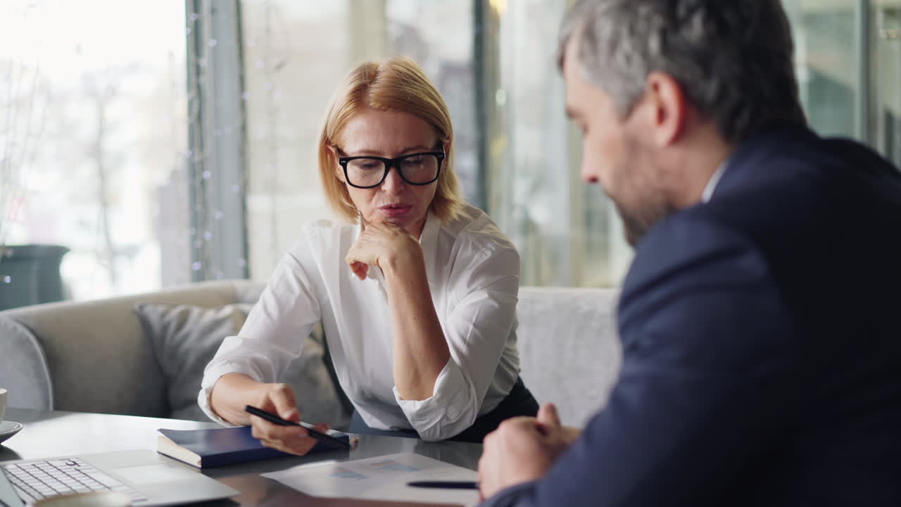Business Meeting in a Cafe