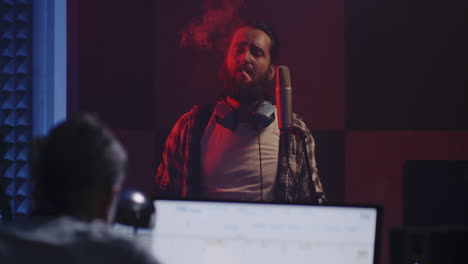 musician recording vocals in a studio
