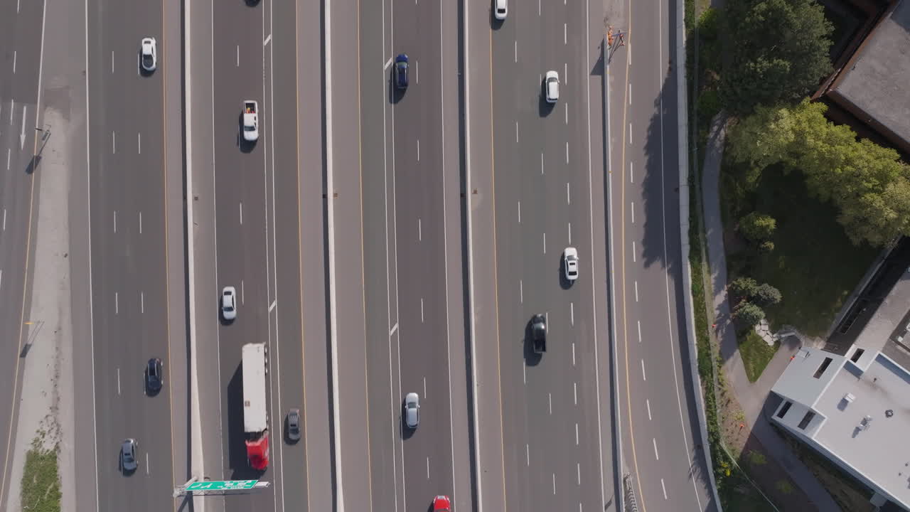 Vehicles on highway 401, mississauga, canada in slow motion, aerial view