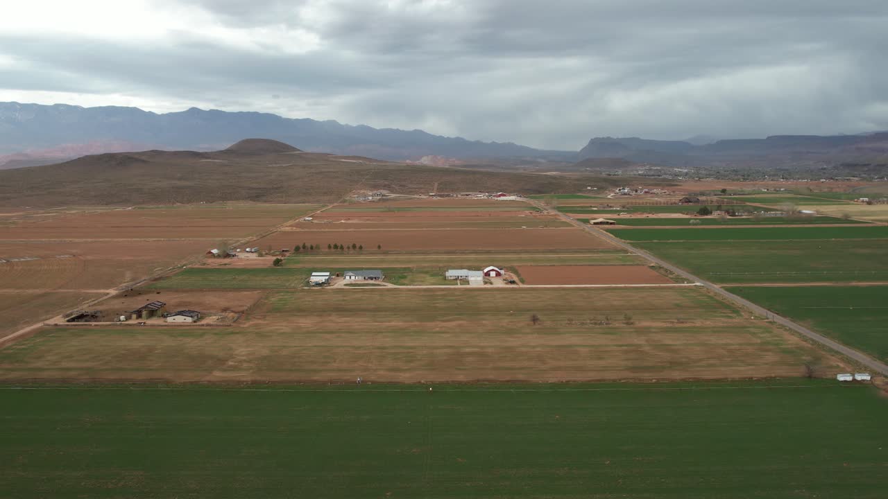 Aerial View of Farming Fields and Ranch Buildings in Countryside of Utah USA, Drone Shot