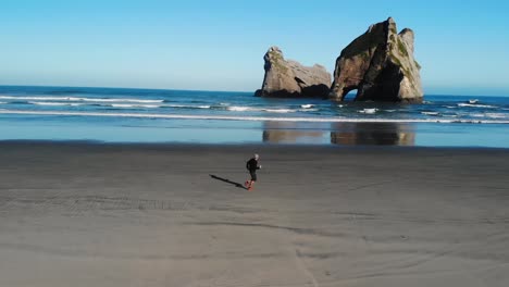 Man-running-at-beautiful-New-Zealand-spot