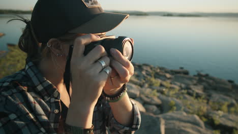 female photographer taking pictures of nature