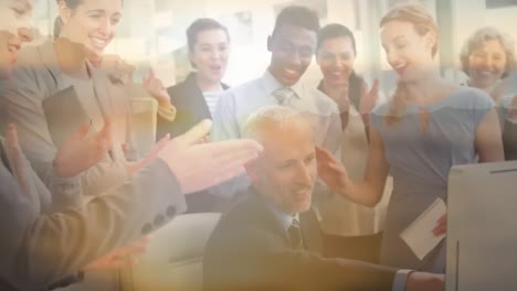 Colleagues-cheering-in-an-office