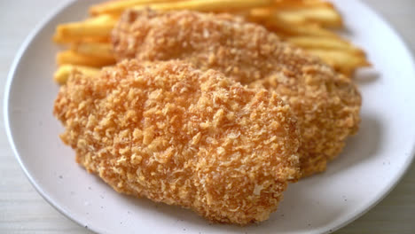 fried chicken breast fillet steak with french fries and ketchup