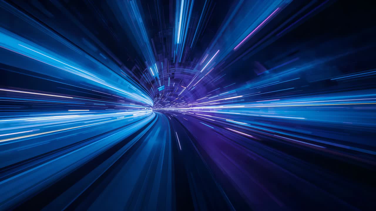 Racing camera moving through curved transit tube guideway, producing radial LED streaks