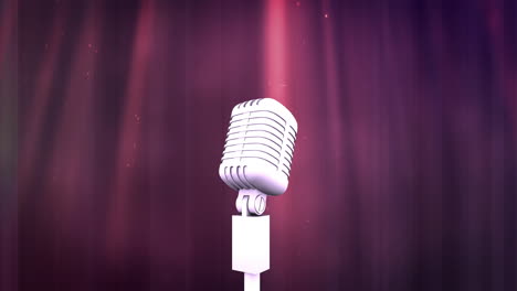 animation of spotlight on retro microphone in front of dark red theatre curtain