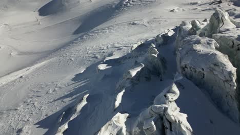 aerial panning shot: mountain landscape, alps winter environment