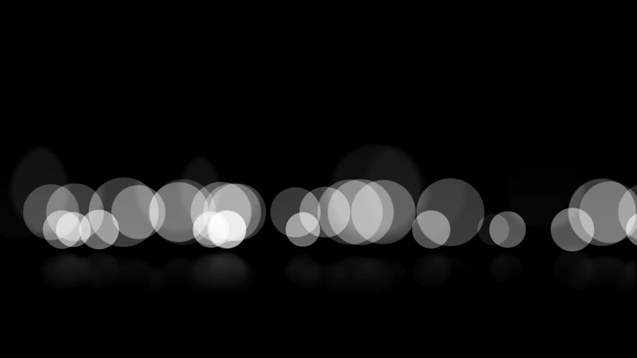 무결한 루프 추상적인 모션 배경: 보케 또는 디포커스 백색 입자 및 반사 애니메이션.