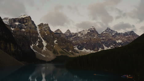 moraine lake and rocky mountains in banff national park, alberta, canada at sunrise - wide, static shot