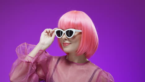 Portrait-Of-Pretty-Woman-Wearing-A-Pink-Wig