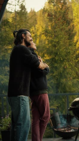 couple enjoying a romantic picnic on a patio with a mountain view