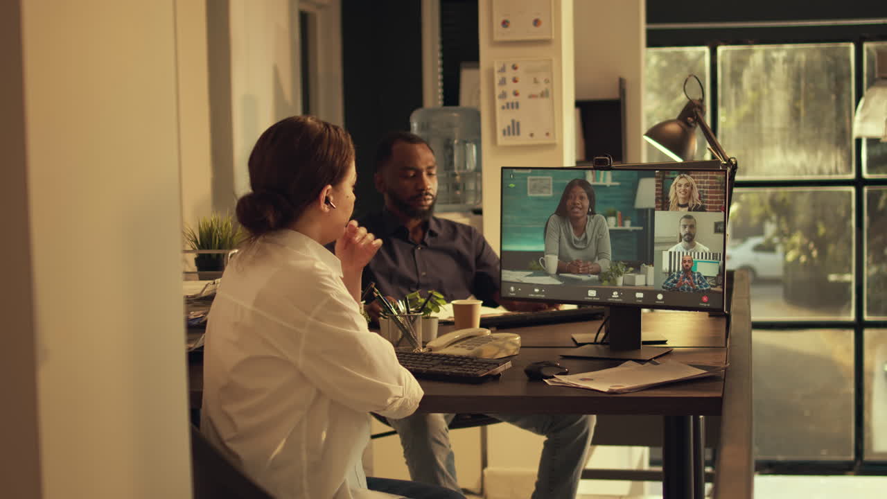 Office worker attending videocall online meeting