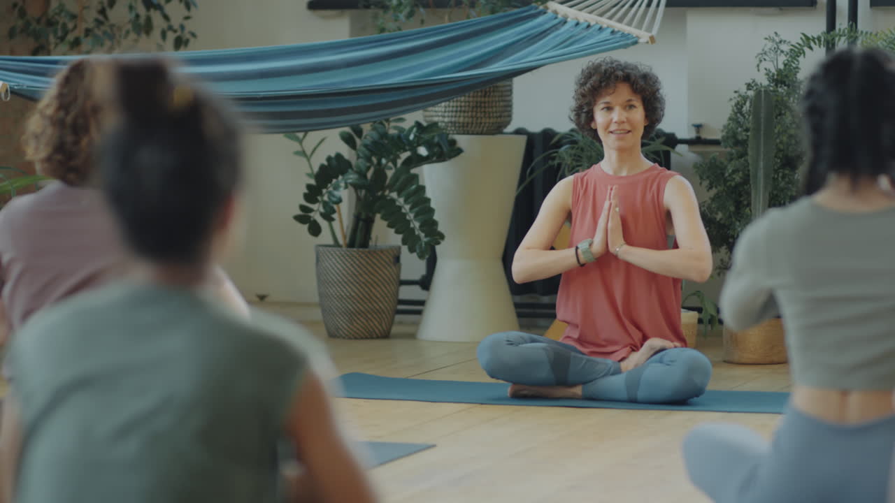 Women Practicing Yoga in Group
