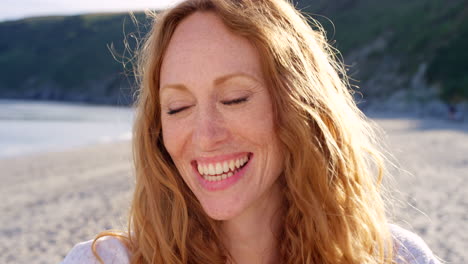 smiling woman on the beach