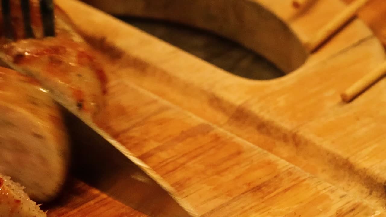Grilled Sausage on a Wooden Cutting Board