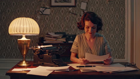 woman reading documents in vintage office