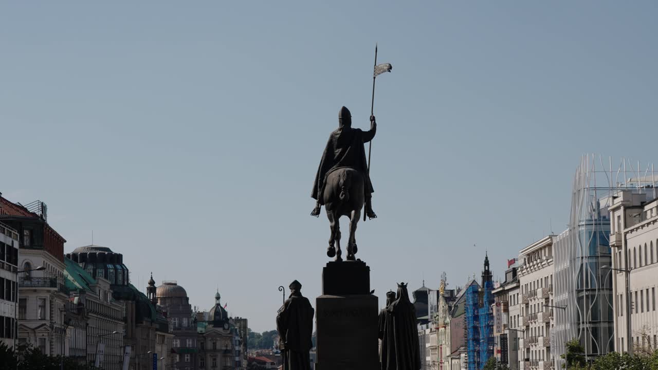 Silhouette of Saint Wenceslas statue on horseback at Wenceslas Square in Prague