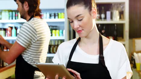 waitress using digital tablet