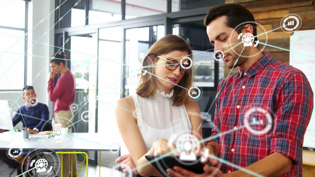 Animación de una red de conexiones con iconos de personas sobre un hombre y una mujer diversos usando una tablet