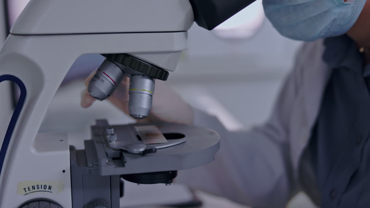 Microscope, sample and science with woman