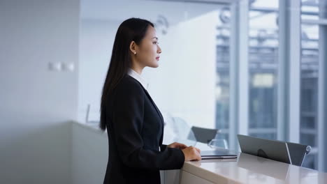businesswoman at reception desk