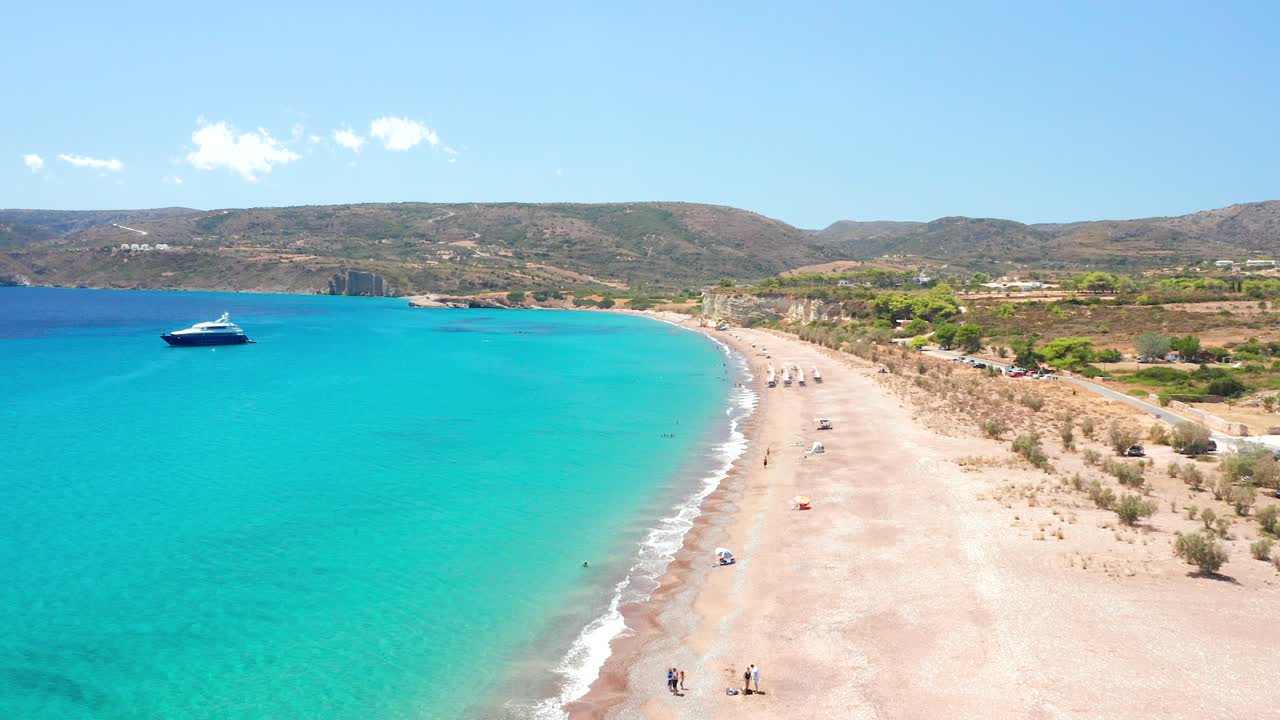 Luxury yacht anchored in turquoise water near the Paleopoli Beach, Kythira