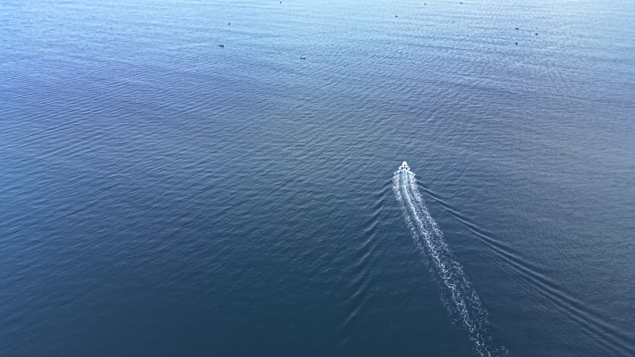 Vessel navigating through calm waters in a tranquil coastal area