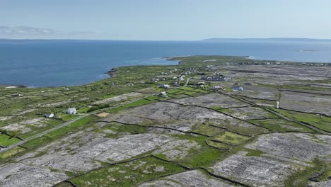 drone flight over inismor aran islands west of ireland wit the mainland in the background