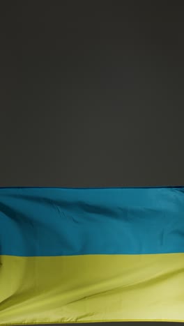 Vertical-Pedestal-Shot-of-Ukrainian-Flag