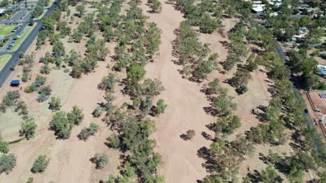 aerial view of the dry todd river in the full sun. alice springs, mparntwe, northern territory, australia. august 2022.