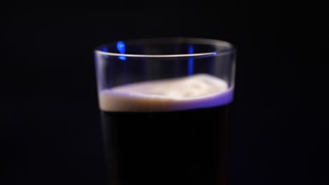 A-foamy-cold-brew-drink-being-mixed-with-air