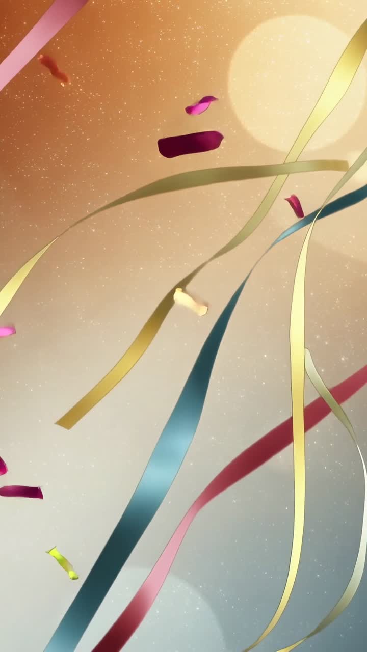 Vertical video: Animating ribbons and confetti drifting in portrait with bokeh, for celebration